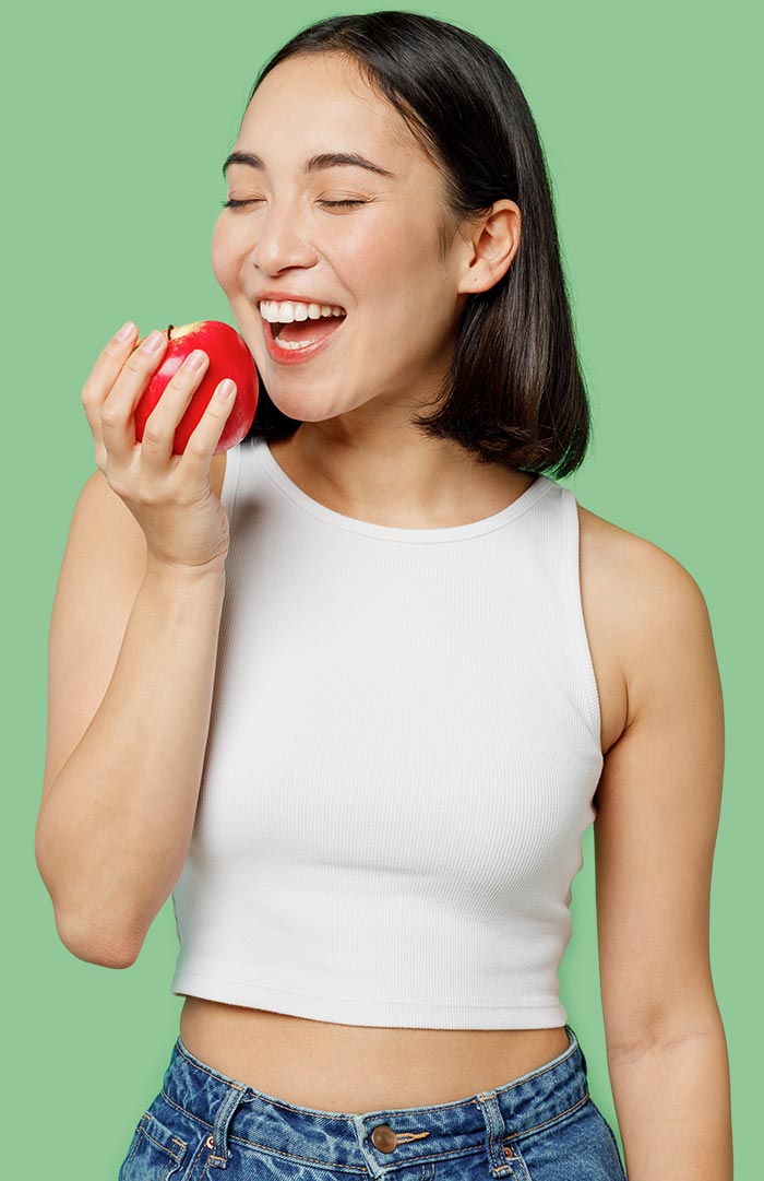 Woman eating fruit